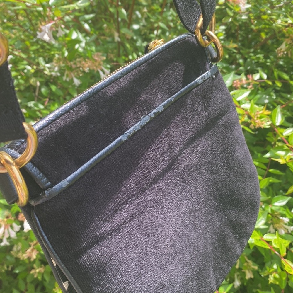 Juicy Couture Black satchel!!!!!!! Poka-Dot Interior soft material
ITEM #1 - Picture 7 of 16